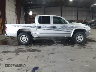 2004 Dodge Dakota SLT with VIN 1D7HG48N64S523528, listed as a IAAI auction lot 41199575 with 261,239 mi miles. Bid and sale history available at carsss.com. Image 13.