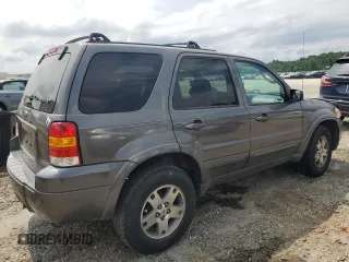 2005 Ford Escape Limited with VIN 1FMYU04115KA63383, listed as a Copart auction lot 59706164 with 212,167 mi miles and Salvage Title. Bid and sale history available at carsss.com. Image 3.
