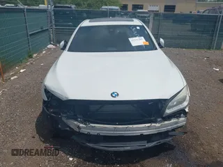 2015 BMW 7 Series 750Li xDrive with VIN WBAYF8C57FD655004, listed as a IAAI auction lot 42272205 with 77,677 mi miles and . Bid and sale history available at DreamBid. Image 13.