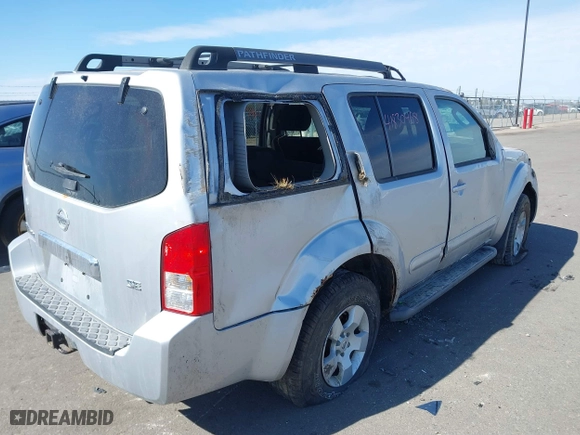 2005 Nissan Pathfinder LE with VIN 5N1AR18W05C779913, listed as a IAAI auction lot 41830468 with 216,967 mi miles. Bid and sale history available at carsss.com. Image 4.