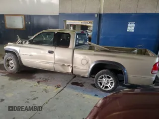 2002 Dodge Dakota with VIN 1B7GL12XX2S569628, listed as a Copart auction lot 85619724 with 165,154 mi miles and Salvage Title. Bid and sale history available at carsss.com. Image 2.
