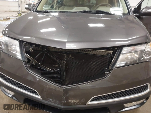 2010 Acura MDX Technology Pkg with VIN 2HNYD2H6XAH515333, listed as a IAAI auction lot 41834679 with 128,224 mi miles. Bid and sale history available at carsss.com. Image 6.