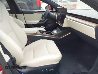 2022 Tesla Model S with VIN 5YJSA1E58NF470737, listed as a IAAI auction lot 42035040 with 15,224 mi miles and . Bid and sale history available at DreamBid. Image 5.