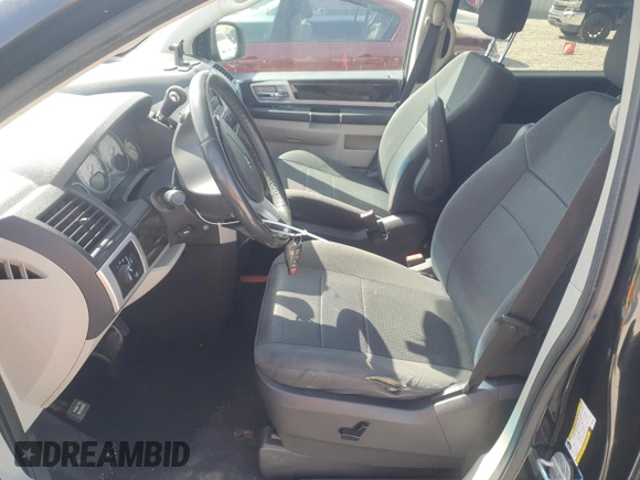 2010 Dodge Grand Caravan with VIN 2D4RN5D1XAR323622, listed as a Copart auction lot 52638465 with 158,491 mi miles and Salvage Title. Bid and sale history available at DreamBid. Image 7.