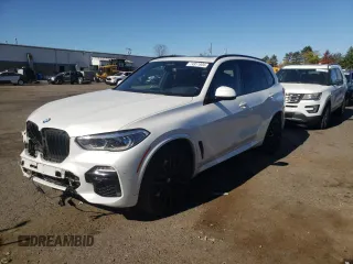 2020 BMW X5 M50i with VIN 5UXJU4C06L9C45320, listed as a Copart auction lot 74911604 with 78,465 mi miles and Salvage Title. Bid and sale history available at carsss.com. Image 1.