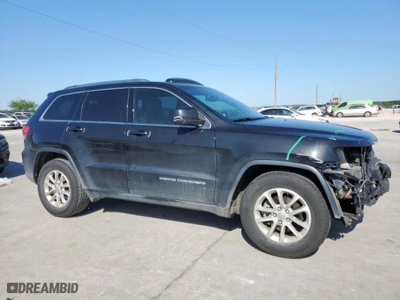 2014 Jeep Grand Cherokee Laredo with VIN 1C4RJEAG6EC145613, listed as a Copart auction lot 52340025 with 118,793 mi miles and Salvage Title. Bid and sale history available at carsss.com. Image 4.