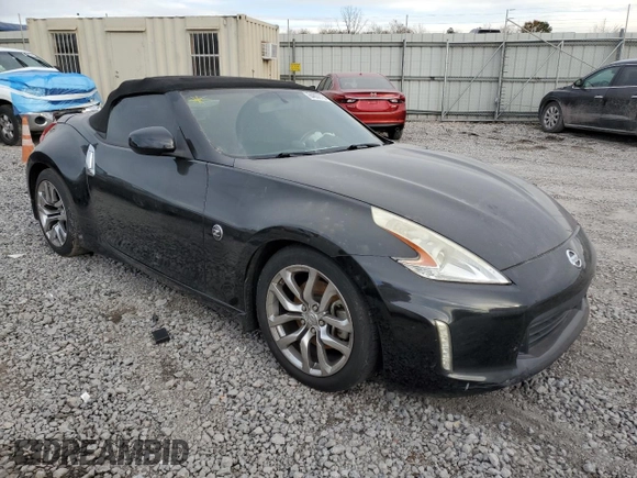 2014 Nissan 370Z Touring with VIN JN1AZ4FHXEM621358, listed as a Copart auction lot 84832164 with 65,441 mi miles and Salvage Title. Bid and sale history available at DreamBid. Image 4.