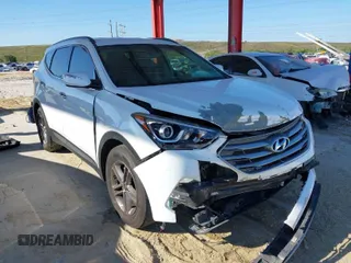 2017 Hyundai Santa Fe 2.4L z VIN 5NMZU3LB0HH006242, wystawiony jako IAAI lot #41775531 z przebiegiem 106 115 mil mil oraz . Historia ofert i sprzedaży dostępna na DreamBid. Obrazek 1.