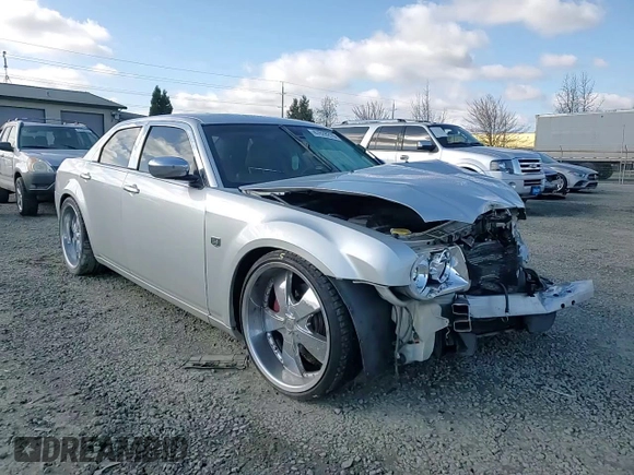 2005 Chrysler 300 C with VIN 2C3AA63H15H674199, listed as a Copart auction lot 47628215 with 154,052 mi miles and Salvage Title. Bid and sale history available at DreamBid. Image 10.