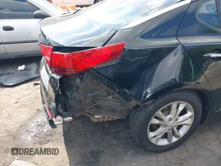 2013 Kia Optima EX z VIN 5XXGN4A71DG184078, wystawiony jako IAAI lot #42124359 z przebiegiem 196 389 mil mil oraz . Historia ofert i sprzedaży dostępna na DreamBid. Obrazek 13.