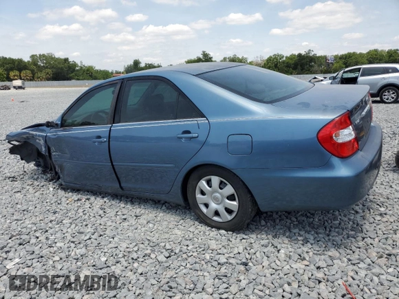 2004 Toyota Camry LE with VIN 4T1BE32K24U874998, listed as a Copart auction lot 53823075 with 256,224 mi miles and Salvage Title. Bid and sale history available at DreamBid. Image 2.