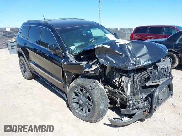 2013 Jeep Grand Cherokee Laredo with VIN 1C4RJFAG2DC643926, listed as a IAAI auction lot 41723575 with 125,048 mi miles. Bid and sale history available at carsss.com. Image 1.