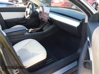 2018 Tesla Model 3 Long Range Battery with VIN 5YJ3E1EB6JF122167, listed as a IAAI auction lot 41761710 with 76,199 mi miles and . Bid and sale history available at DreamBid. Image 5.