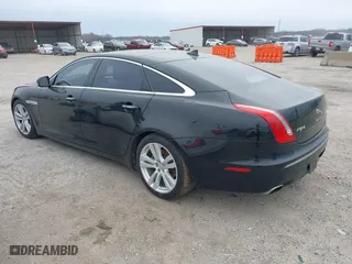 2015 Jaguar XJ with VIN SAJWJ2GD0F8V85914, listed as a IAAI auction lot 41615059 with 115,462 mi miles. Bid and sale history available at carsss.com. Image 3.