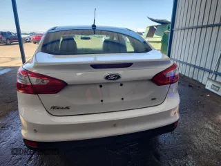 2014 Ford Focus SE with VIN 1FADP3F24EL221250, listed as a Copart auction lot 52379245 with 52,883 mi miles and Salvage Title. Bid and sale history available at DreamBid. Image 6.