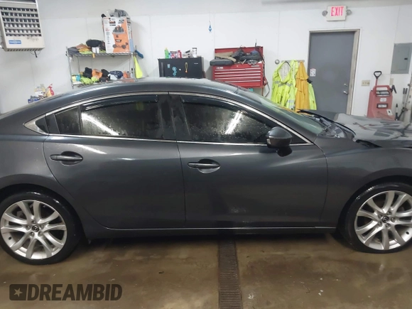 2016 Mazda Mazda6 i Touring with VIN JM1GJ1V53G1481551, listed as a IAAI auction lot 41525760 with 89,880 mi miles. Bid and sale history available at carsss.com. Image 14.