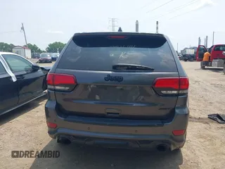 2018 Jeep Grand Cherokee SRT z VIN 1C4RJFDJ7JC281644, wystawiony jako IAAI lot #42481239 z przebiegiem 160 218 mil mil oraz . Historia ofert i sprzedaży dostępna na DreamBid. Obrazek 16.