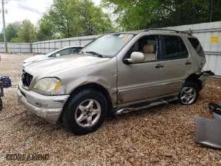 2001 Mercedes-Benz M-Class with VIN 4JGAB54E01A275750, listed as a Copart auction lot 83097924 with 233,218 mi miles and Non Repairable. Bid and sale history available at carsss.com. Image 1.