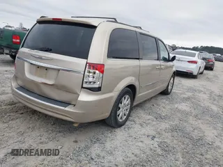 2016 Chrysler Town & Country Touring with VIN 2C4RC1BG1GR205535, listed as a IAAI auction lot 41183078 with 99,968 mi miles and . Bid and sale history available at DreamBid. Image 4.