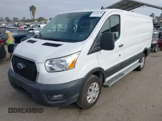 2021 Ford Transit Cargo with VIN 1FTBR1Y85MKA69355, listed as a IAAI auction lot 42544780 with 33,288 mi miles and . Bid and sale history available at DreamBid. Image 2.