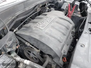 2007 Honda Pilot EX-L with VIN 5FNYF28557B028997, listed as a IAAI auction lot 41742267 with 217,114 mi miles. Bid and sale history available at carsss.com. Image 10.