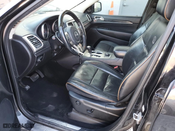 2013 Jeep Grand Cherokee Overland Summit with VIN 1C4RJFCT1DC568369, listed as a Copart auction lot 42027085 with 150,002 mi miles and Salvage Title. Bid and sale history available at carsss.com. Image 7.