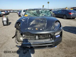 2023 Porsche Macan S z VIN WP1AG2A58PLB40570, wystawiony jako Copart lot #54801095 z przebiegiem Nie podano mil oraz Szkoda całkowita • Salvage title. Historia ofert i sprzedaży dostępna na DreamBid. Obrazek 5.
