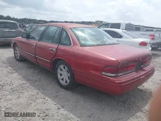 1996 Ford Crown Victoria with VIN 2FALP73W9TX127763, listed as a IAAI auction lot 41935853 with 1 mi miles. Bid and sale history available at carsss.com. Image 3.