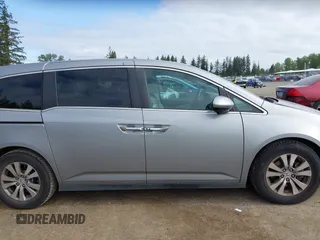 2016 Honda Odyssey EX-L with VIN 5FNRL5H60GB070789, listed as a IAAI auction lot 42148249 with 64,691 mi miles. Bid and sale history available at carsss.com. Image 13.