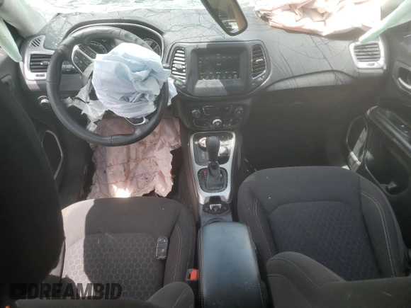 2021 Jeep Compass Sport with VIN 3C4NJDAB7MT598591, listed as a Copart auction lot 56057145 with 77,215 mi miles and Salvage title. Bid and sale history available at DreamBid. Image 8.