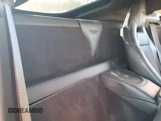 2020 Aston Martin Vantage z VIN SCFSMGAWXLGN03122, wystawiony jako Copart lot #77734374 z przebiegiem Nie podano mil oraz Szkoda całkowita • Salvage title. Historia ofert i sprzedaży dostępna na DreamBid. Obrazek 10.
