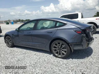 2023 Tesla Model 3 z VIN 5YJ3E1EA0PF571943, wystawiony jako Copart lot #58338235 z przebiegiem 41 584 mil mil oraz Szkoda całkowita • Salvage title. Historia ofert i sprzedaży dostępna na DreamBid. Obrazek 2.