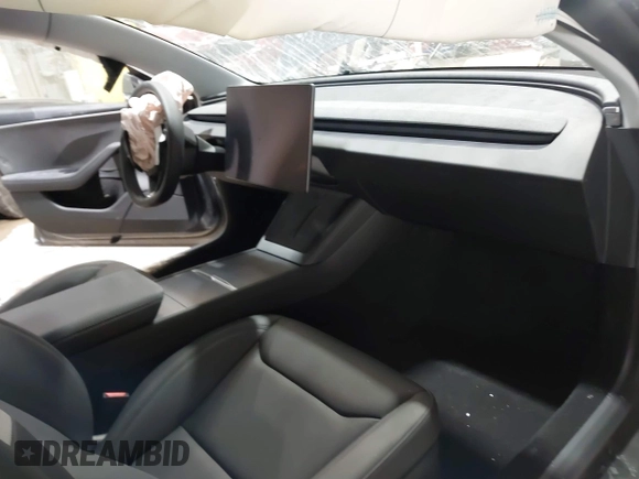 2025 Tesla Model 3 Long Range with VIN 5YJ3E1EA4SF913869, listed as a IAAI auction lot 41416608 with 1,141 mi miles and . Bid and sale history available at DreamBid. Image 5.