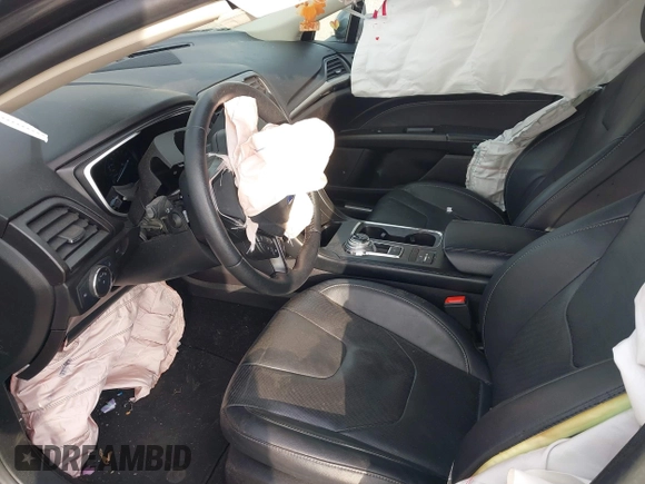 2019 Ford Fusion Hybrid Titanium with VIN 3FA6P0RU9KR158129, listed as a IAAI auction lot 41717104 with 37,736 mi miles. Bid and sale history available at carsss.com. Image 5.
