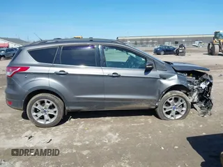 2013 Ford Escape SEL with VIN 1FMCU9H98DUB89046, listed as a IAAI auction lot 41794795 with 89,819 mi miles and . Bid and sale history available at DreamBid. Image 13.
