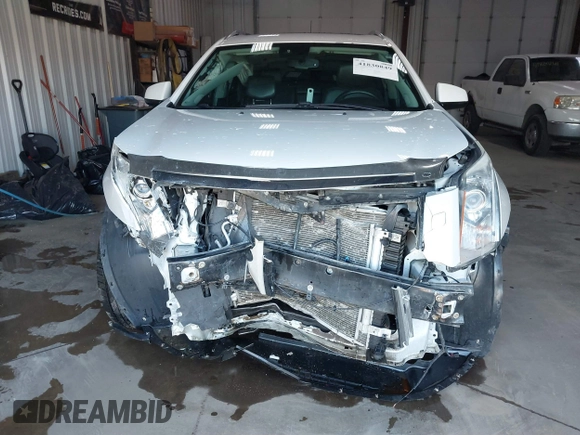 2014 Cadillac SRX Performance Collection with VIN 3GYFNFE36ES615440, listed as a IAAI auction lot 41830849 with 125,128 mi miles and . Bid and sale history available at DreamBid. Image 13.