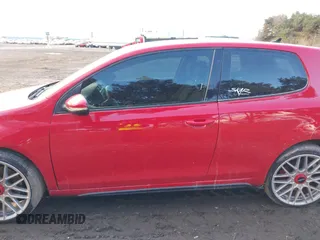 2012 Volkswagen GTI w/Conv & Sunroof z VIN WVWEV7AJ9CW292286, wystawiony jako IAAI lot #41478359 z przebiegiem 153 000 mil mil oraz . Historia ofert i sprzedaży dostępna na DreamBid. Obrazek 14.