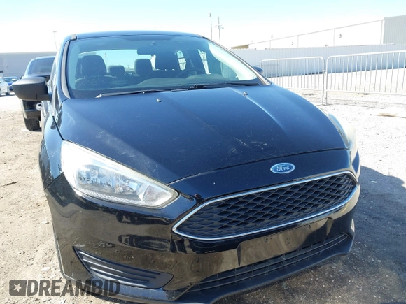 2018 Ford Focus S with VIN 1FADP3E29JL259004, listed as a IAAI auction lot 41841485 with 77,567 mi miles. Bid and sale history available at carsss.com. Image 12.