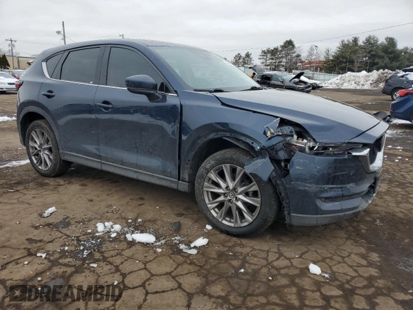 2019 Mazda CX-5 Grand Touring with VIN JM3KFBDM6K0667925, listed as a Copart auction lot 44657565 with 71,359 mi miles and Salvage Title. Bid and sale history available at carsss.com. Image 4.