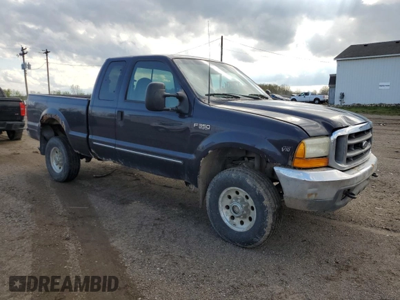 2000 Ford F-350 XL with VIN 1FTSX31S2YEE37213, listed as a Copart auction lot 54300595 with 141,273 mi miles and Clean title. Bid and sale history available at DreamBid. Image 4.