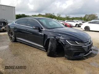 2019 Volkswagen Arteon SEL R-Line с VIN WVWSR7AN1KE025626, выставлен на аукционе Copart как лот 47225553 с пробегом 39 822 миль миль и . История ставок и продаж доступна на DreamBid. Изображение 4.