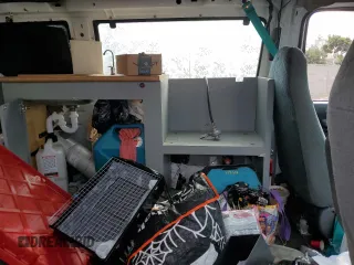 1995 Ford Econoline Wagon XL z VIN 1FBJS31H0SHB49053, wystawiony jako Copart lot #44952525 z przebiegiem Nie podano mil oraz Szkoda całkowita • Salvage title. Historia ofert i sprzedaży dostępna na DreamBid. Obrazek 12.