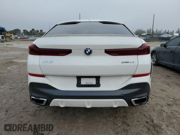 2021 BMW X6 sDrive40i z VIN 5UXCY4C08M9F34312, wystawiony jako Copart lot #87206474 z przebiegiem 67 851 mil mil oraz Czysty tytuł • Clean title. Historia ofert i sprzedaży dostępna na DreamBid. Obrazek 6.