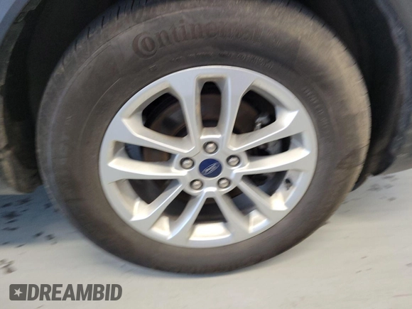 2022 Ford Escape SE with VIN 1FMCU9G68NUB32497, listed as a IAAI auction lot 42727937 with 64,577 mi miles and . Bid and sale history available at DreamBid. Image 4.