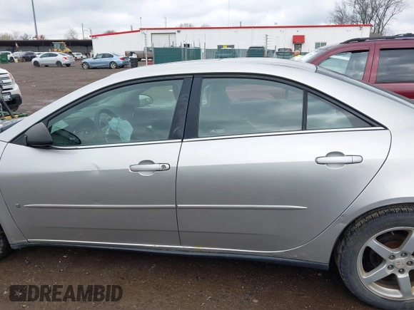 2006 Pontiac G6 6-Cyl with VIN 1G2ZG558464289212, listed as a IAAI auction lot 41994843 with 126,502 mi miles. Bid and sale history available at carsss.com. Image 14.