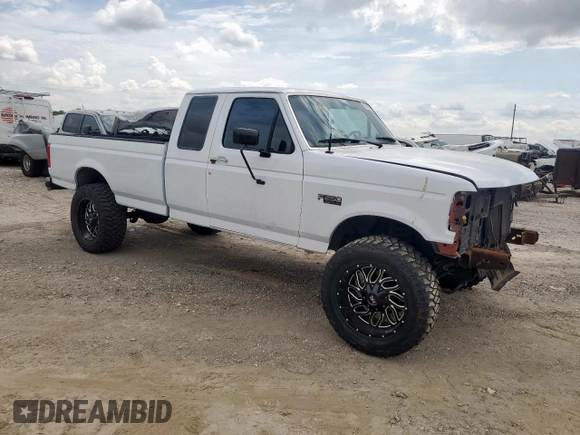 1994 Ford F-250 with VIN 1FTHX25H5RKB57176, listed as a Copart auction lot 63432875 with 188,923 mi miles and Salvage title. Bid and sale history available at DreamBid. Image 4.