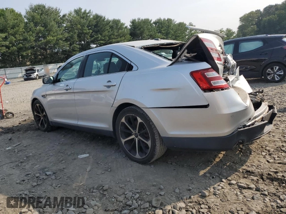 2014 Ford Taurus SEL with VIN 1FAHP2E8XEG184523, listed as a Copart auction lot 67643764 with 157,851 mi miles and Salvage Title. Bid and sale history available at carsss.com. Image 2.