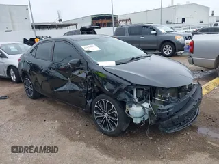 2014 Toyota Corolla L with VIN 5YFBURHE6EP026648, listed as a IAAI auction lot 41894683 with 167,642 mi miles and . Bid and sale history available at DreamBid. Image 1.