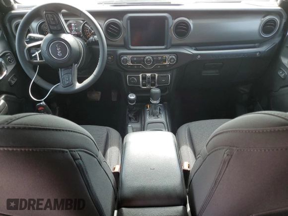 2023 Jeep Wrangler Willys with VIN 1C4HJXDGXPW526093, listed as a Copart auction lot 56818935 with 24,021 mi miles and Salvage title. Bid and sale history available at DreamBid. Image 8.
