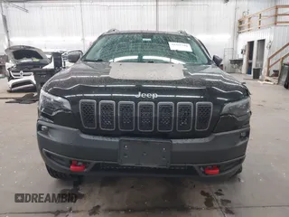 2019 Jeep Cherokee Trailhawk with VIN 1C4PJMBX9KD456748, listed as a IAAI auction lot 42367186 with 91,665 mi miles and . Bid and sale history available at DreamBid. Image 12.